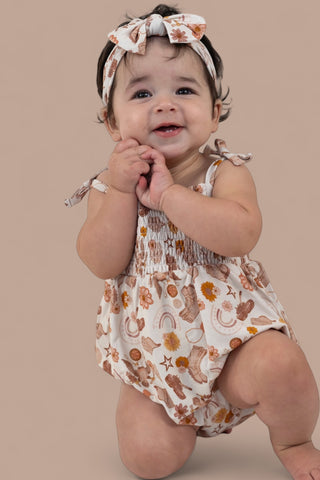 FLOWERS AND BOOTS DREAM BUBBLE ROMPER