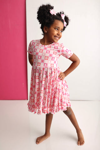 X'S & O'S SHORT SLEEVE DREAM RUFFLE DRESS