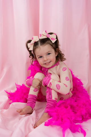 PUCKER UP DREAM RUFFLE ROMPER